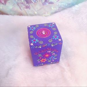 vintage 2000s claire’s coin bank (purple floral)